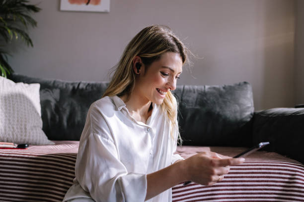 istock Woman Face Timing On Her Tablet Device 1388404661