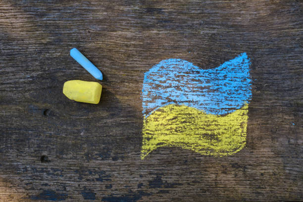 Flag of Ukraine drawn with crayons on a wooden background. Independence of Ukraine. Ukraine love concept. Crayons for drawing. creative background stock photo