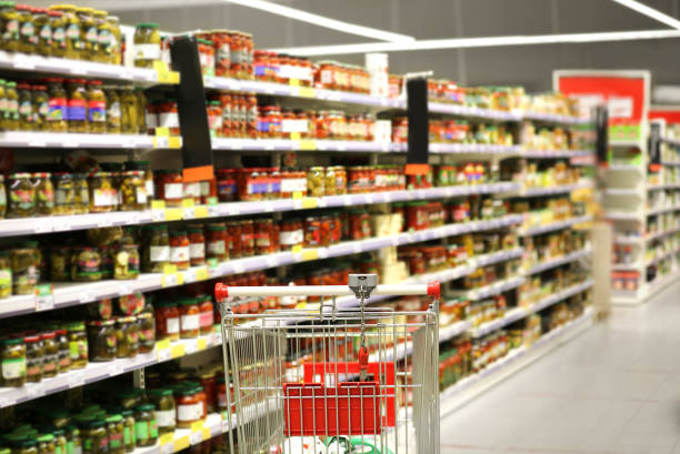 istock empty grocery cart in an empty supermarket 1388406471