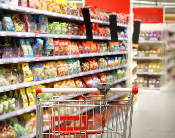 istock empty grocery cart in an empty supermarket 1388406476