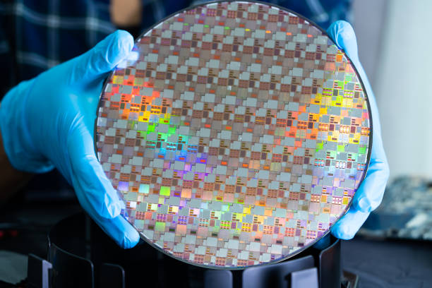 istock Silicon wafer for manufacturing semiconductor of integrated circuit. 1388406845