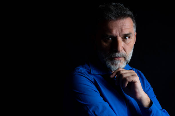 istock A man looking away contemplatively 1388410841