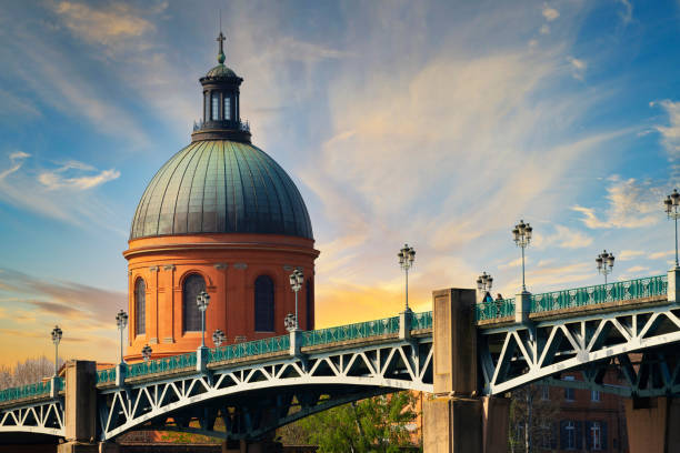 istock Famous view of Saint-Pierre bridge at sunset 1388413577
