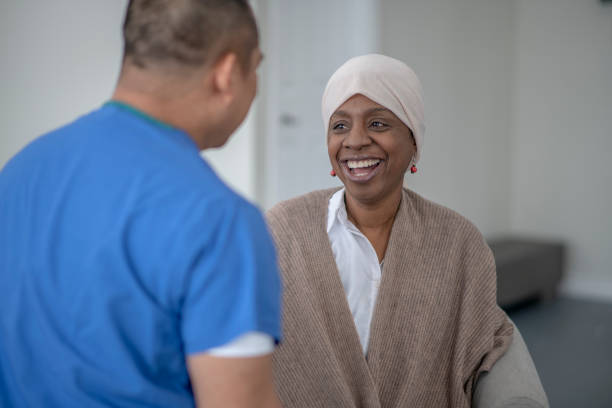 istock Doctor Making a Home Visit to a Cancer Patient 1388415537