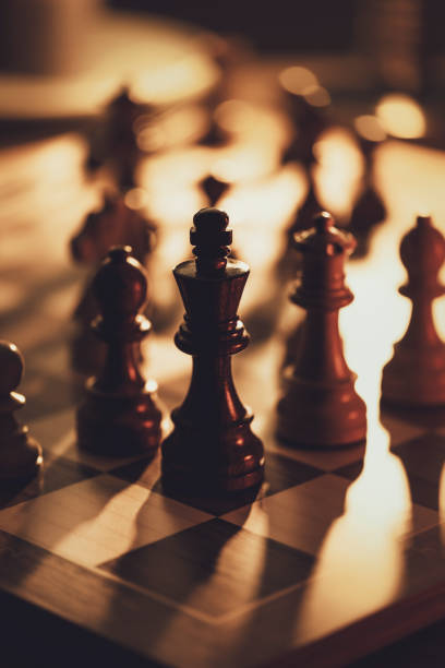 istock Chess pieces on the chessboard 1388415881