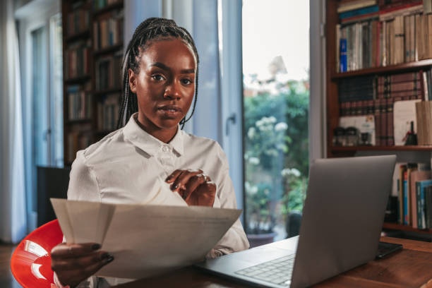 istock Woman working at home 1388417619