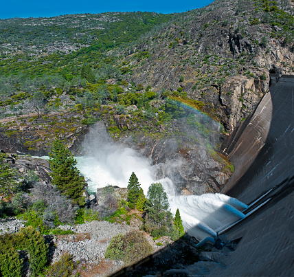 The O'Shaughnessy Dam is a curved gravity dam on the Tuolumne River in the Hetch Hetchy Valley of California's Sierra Nevada. The dam is located in Yosemite National Park, and creates the Hetch Hetchy Reservoir. It is named for former San Francisco chief engineer and the original chief engineer of the Hetch Hetchy Project Michael M. O'Shaughnessy.