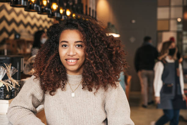 istock Woman at a restaurant counter 1388418080
