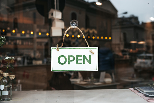 Open sign on small business window
