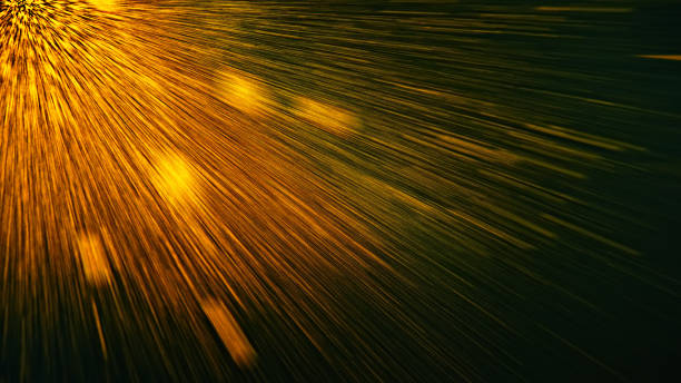 istock Abstract blurred background golden radial sparks on black. 1388419558