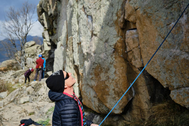 istock A Happy Male climber standing near cliff 1388420285