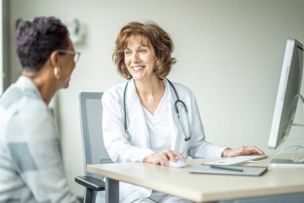 istock Senior Woman at a Doctors Appointment 1388420531