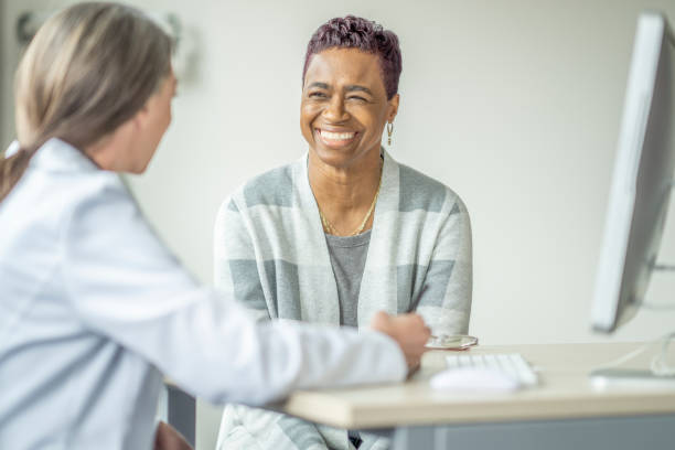 istock Senior Woman At the Doctors 1388420540