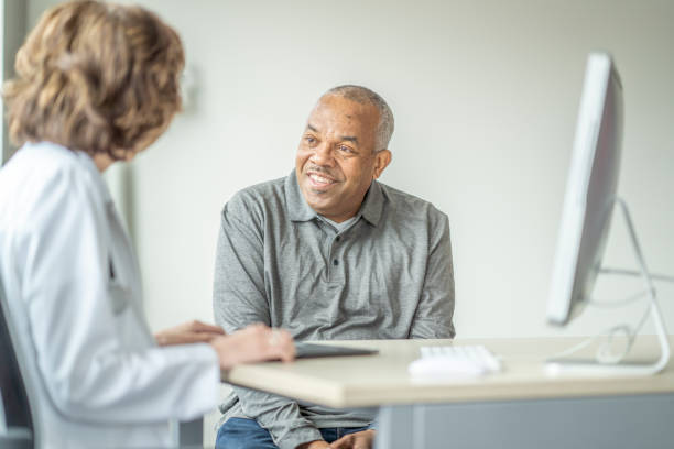 istock Senior Gentleman at a Doctors Appointment 1388420546