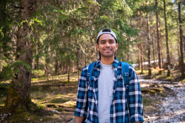 istock Young tourist from India exploring the Alps 1388421441