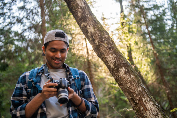 istock Young tourist from India exploring the Alps 1388421533