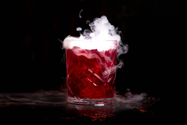 istock halloween cocktail with dry ice on dark background 1388421929