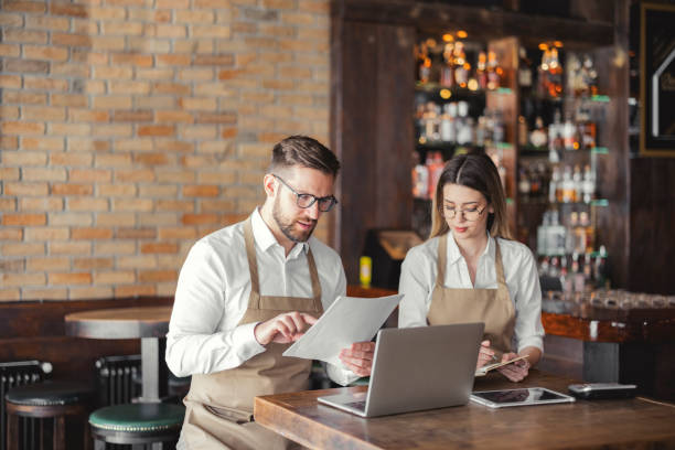 istock Cafe owners making accounting records 1388422969