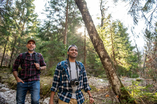 istock Friends hiking in the forest 1388422992