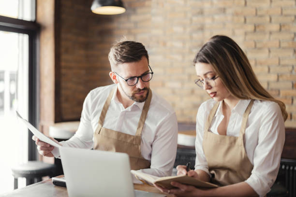 istock Managing their coffee shop 1388423077