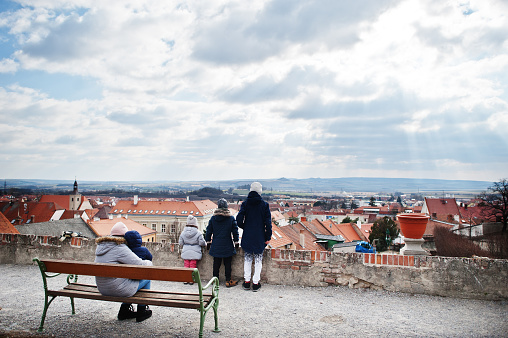 Family enjoying the view of Moravia, Czech Republic. Old European town.