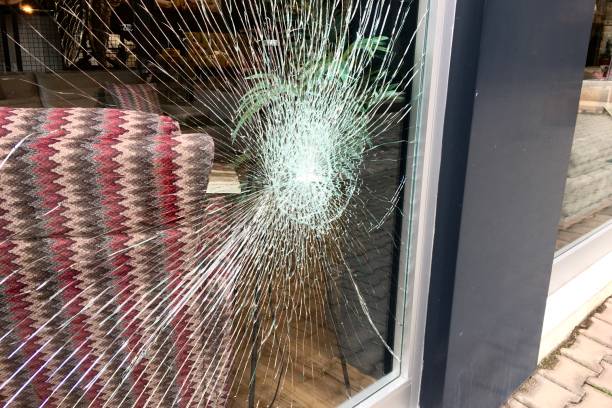 Broken Window Of  Furniture Store. stock photo