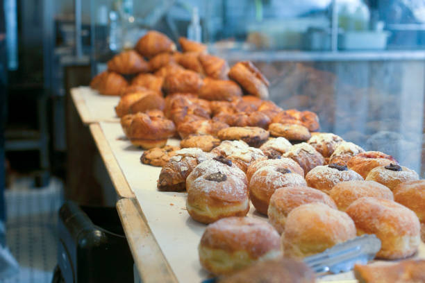 istock Selection of Pastries in Bakery  Window Display. 1388427640