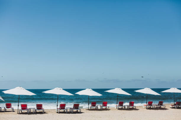 istock Beach umbrella and beach chairs 1388435483