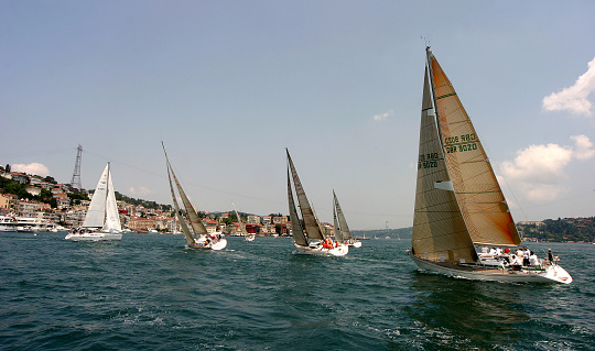 Izmir, Turkey - September 9, 2022: Sailing boats over the sea on celebrations of the liberty day Izmir on September 9 2022