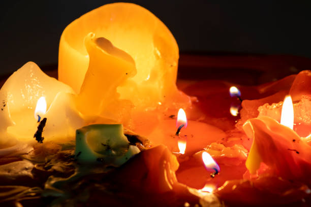 istock Close-up of several candles consuming 1388439438