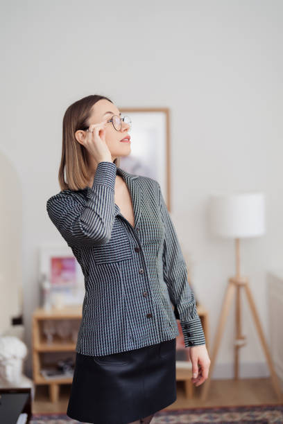 istock Lovely woman posing in an interesting interior 1388444596