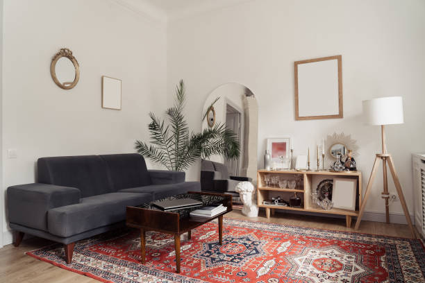 istock Interior design - sofa, a green plant, white walls 1388444647