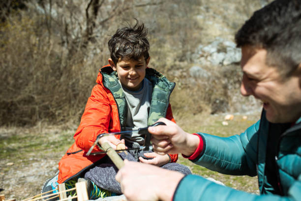istock A happy boy learning crafts from his dad 1388446387