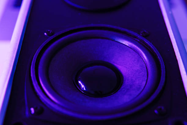 istock sound speaker in purple neon light.Powerful music concept 1388449100