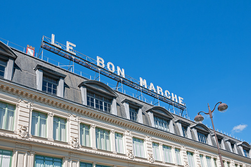 Le Bon Marche facade shopping mall in Paris, rue de Sèvres. It's a luxury department store near Saint Germain des Près quarter, left bank. Paris in France. June 18, 2021.