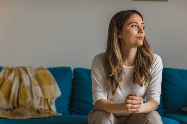 istock Front view of young woman cracking her knuckles while contemplating problems and solutions 1388452944