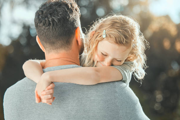 istock Shot of a father spending time outdoors with his young daughter 1388457216