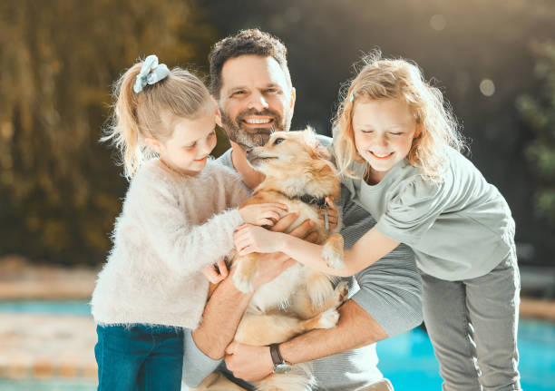 istock Shot of a man spending time outdoors with his two daughters 1388457218