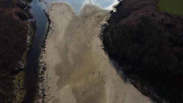 istock zenith aerial drone flight over Stradbally Cove, an Atlantic Ocean beach on the Cooper Coast, Waterford, Ireland. 1388462017