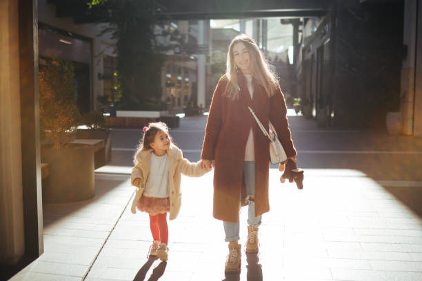 istock Happy mother and daughter shopping 1388462052