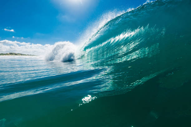 istock Turquoise beach break waves in ocean. Breaking wave with sunshine 1388462701
