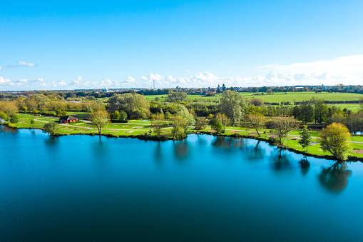 Aerial photo of the village of Milton Keynes in the UK showing a large lake