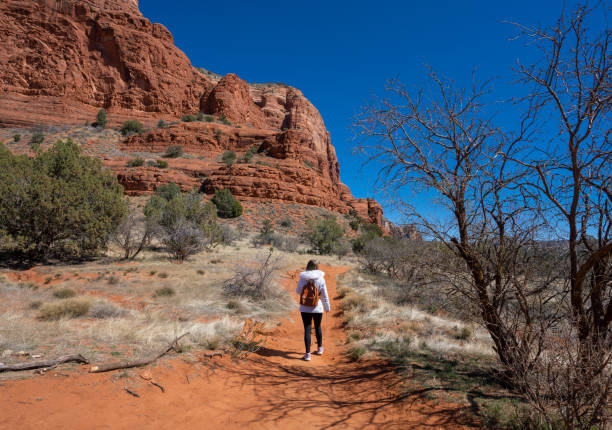 istock Girl on spring hiking trip in red mountains. 1388467347