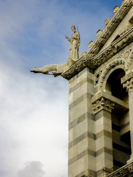 istock Gargoyle of Pisa Cathedral 1388467520