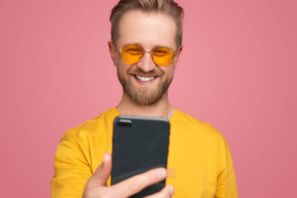 istock Handsome man taking selfie on smartphone 1388469246