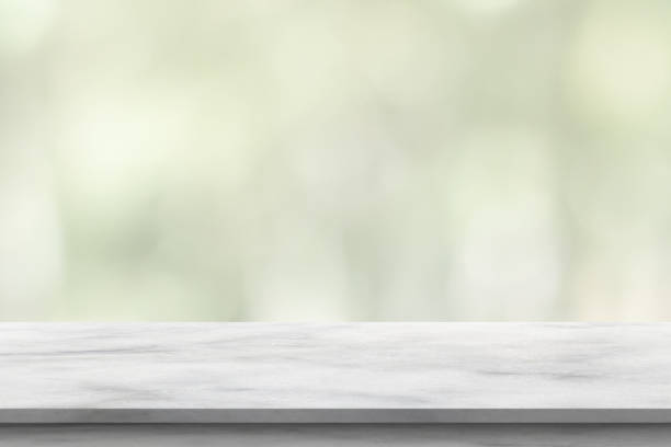istock marble table top with blurred kitchen cafe restaurant interior background 1388469375
