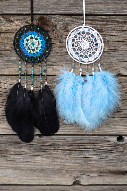 istock Handmade dream catcher with feathers threads and beads rope hanging 1388476972