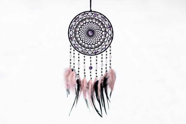 istock Handmade dream catcher with feathers threads and beads rope hanging 1388476975