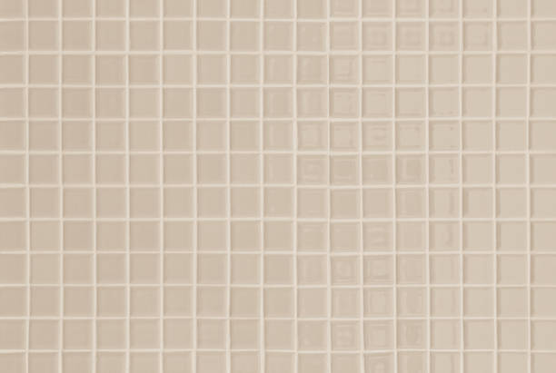 istock Pastel cream ceramic wall and floor tiles mosaic abstract background. Design geometric wallpaper texture decoration bedroom. Simple seamless pattern clean for backdrop advertising banner poster or web. 1388486786