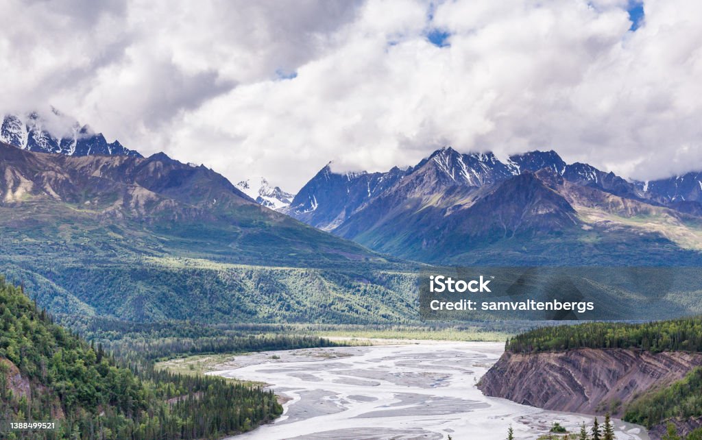 Chugach Mountains and Matanuska River The commanding Chugach Mountains viewed from the Glenn Highway in the US state of Alaska. The Glenn Highway extends 179 miles from Anchorage near Merrill Field to Glennallen on the Richardson Highway. Alaska Range Stock Photo